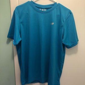 New balance blue dri-fit shirt. Size medium.